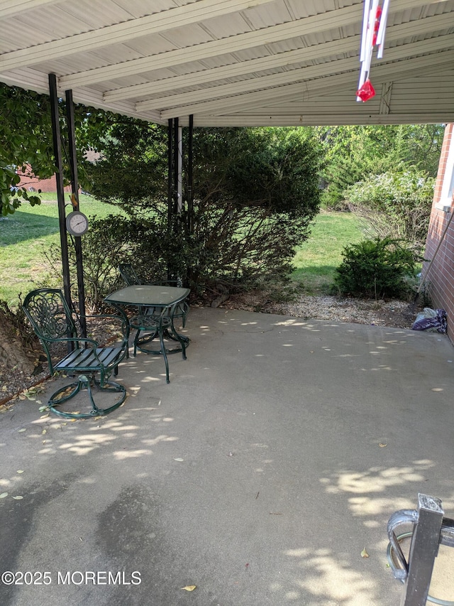 view of patio featuring a carport