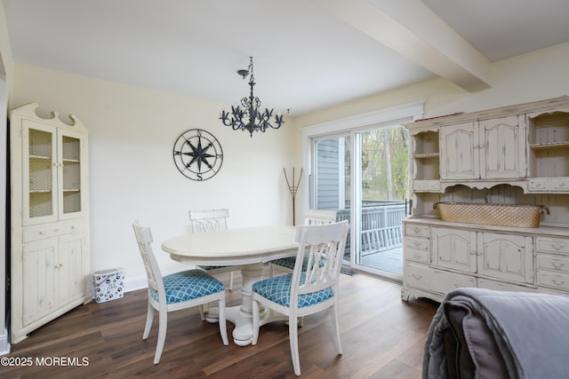 dining area featuring a chandelier, dark wood finished floors, and beam ceiling