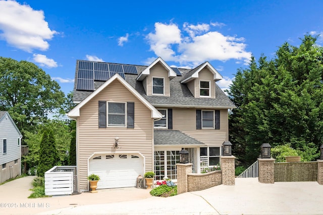 1427 Summit Ave, Toms River, NJ 08753 - view of front of house featuring driveway, a shingled roof, roof mounted solar panels, and an attached garage