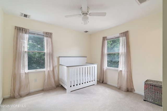 1427 Summit Ave, Toms River, NJ 08753 - unfurnished bedroom featuring carpet floors, baseboards, a crib, and ceiling fan