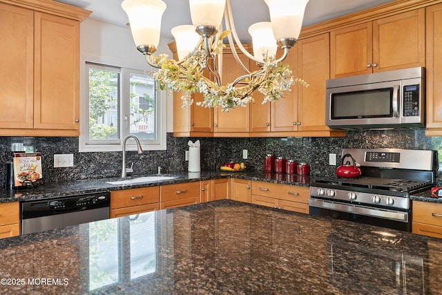 1427 Summit Ave, Toms River, NJ 08753 - kitchen featuring appliances with stainless steel finishes, a sink, a chandelier, and tasteful backsplash