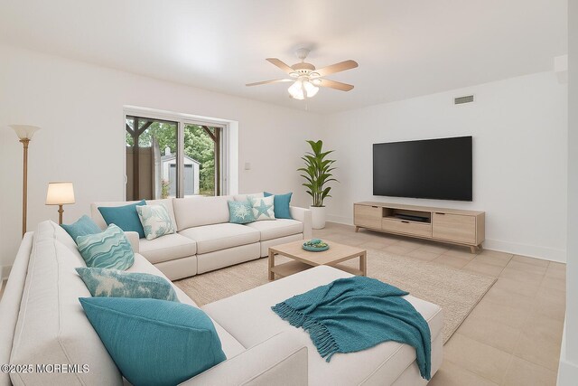 1427 Summit Ave, Toms River, NJ 08753 - living room with a ceiling fan, tile patterned floors, and baseboards