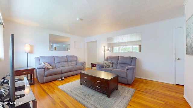 18 Forest Valley Dr, Toms River, NJ 08755 - living area featuring light wood finished floors and baseboards