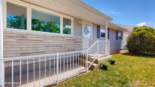 18 Forest Valley Dr, Toms River, NJ 08755 - doorway to property featuring a lawn