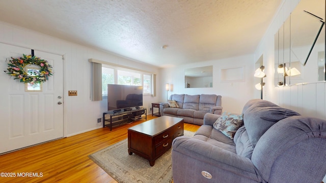 18 Forest Valley Dr, Toms River, NJ 08755 - living room featuring light wood-style floors and a textured ceiling