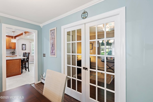 doorway to outside featuring french doors, ornamental molding, a baseboard radiator, and baseboards