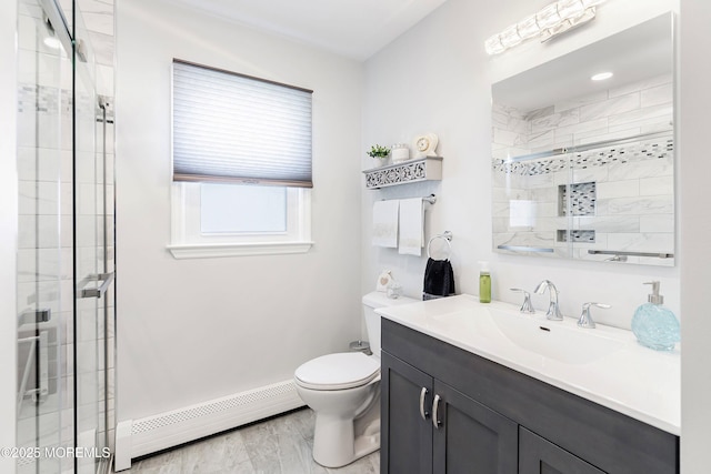 full bath with baseboard heating, a shower stall, toilet, vanity, and baseboards