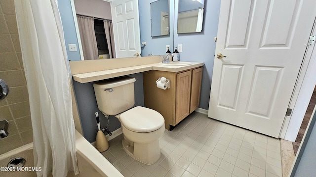 bathroom featuring tile patterned flooring, toilet, vanity, baseboards, and shower / tub combo