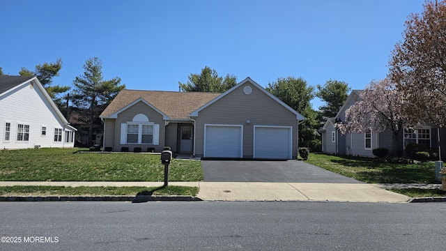 ranch-style home featuring aphalt driveway, a front yard, a shingled roof, and a garage