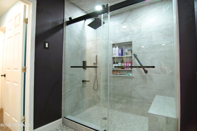 bathroom with a stall shower