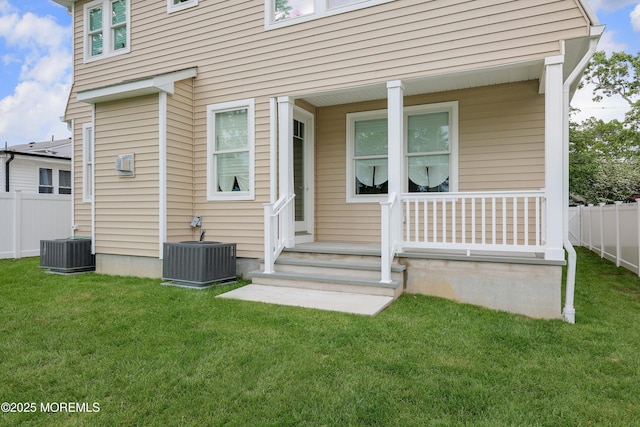 619 Mistletoe Ave, Point Pleasant, NJ 08742 - rear view of house with central AC unit and covered porch