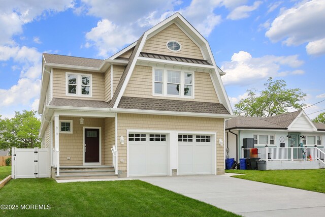 619 Mistletoe Ave, Point Pleasant, NJ 08742 - view of front of house featuring concrete driveway, a gambrel roof, a garage, a gate, and roof with shingles
