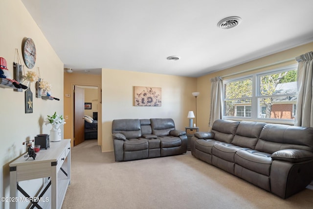 living room with light carpet and visible vents