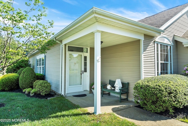 1507 Primrose Pl, Manasquan, NJ 08736 - doorway to property with a porch and roof with shingles