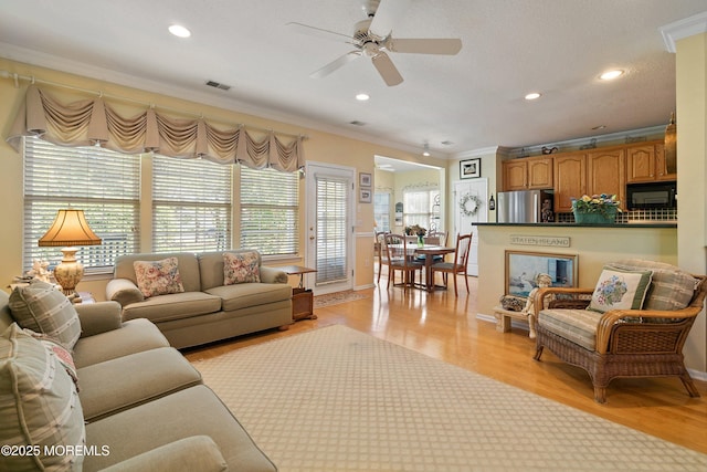1507 Primrose Pl, Manasquan, NJ 08736 - living area featuring ornamental molding, ceiling fan, recessed lighting, and light wood-style flooring