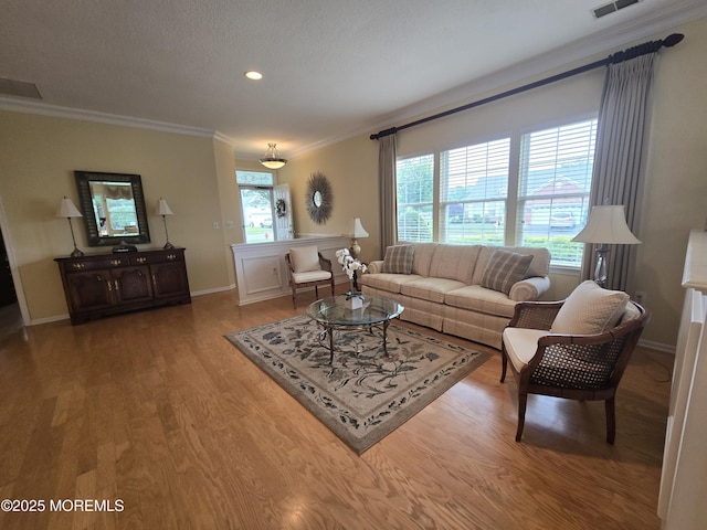 1507 Primrose Pl, Manasquan, NJ 08736 - living area with ornamental molding, wood finished floors, and recessed lighting
