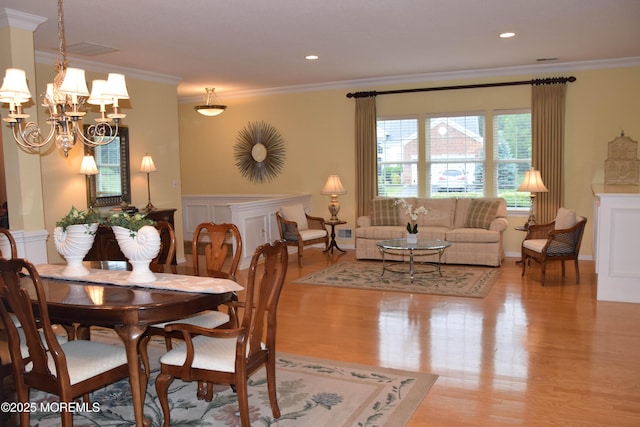 1507 Primrose Pl, Manasquan, NJ 08736 - dining area featuring crown molding, wood finished floors, a chandelier, and recessed lighting