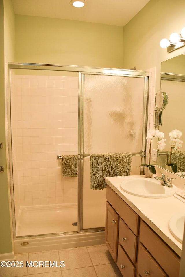 1507 Primrose Pl, Manasquan, NJ 08736 - full bathroom with tile patterned flooring, a stall shower, double vanity, and recessed lighting