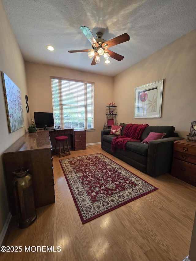 1507 Primrose Pl, Manasquan, NJ 08736 - living room with a ceiling fan, wood finished floors, a textured ceiling, a desk, and recessed lighting