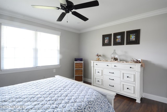 bedroom featuring dark wood finished floors, crown molding, baseboards, and a ceiling fan