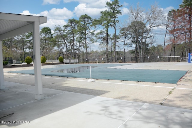 community pool with fence