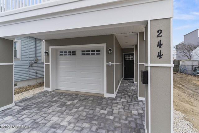 322 Lincoln Ave, Seaside Heights, NJ 08751 - garage with fence and driveway