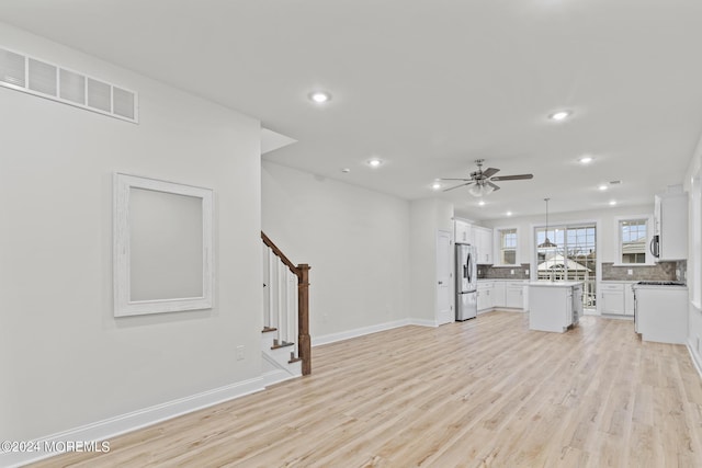 322 Lincoln Ave, Seaside Heights, NJ 08751 - unfurnished living room with stairway, a ceiling fan, light wood-type flooring, visible vents, and recessed lighting