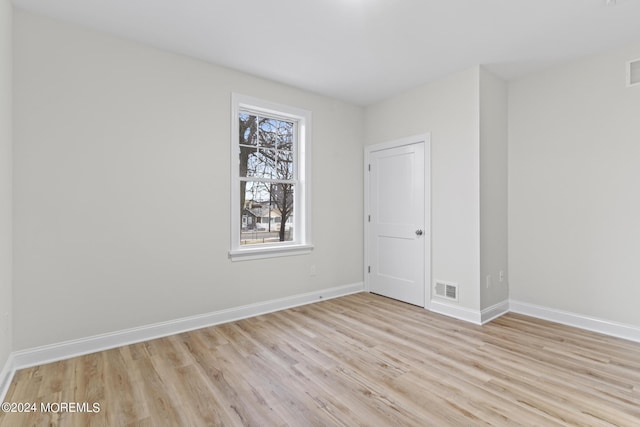 322 Lincoln Ave, Seaside Heights, NJ 08751 - spare room with baseboards, visible vents, and light wood-style flooring