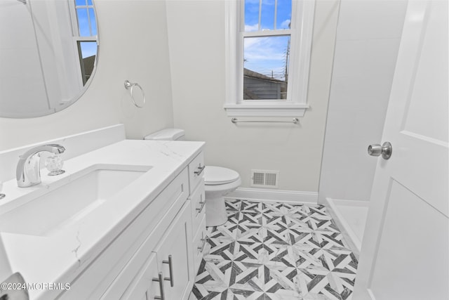 322 Lincoln Ave, Seaside Heights, NJ 08751 - bathroom with tile patterned floors, vanity, baseboards, toilet, and visible vents