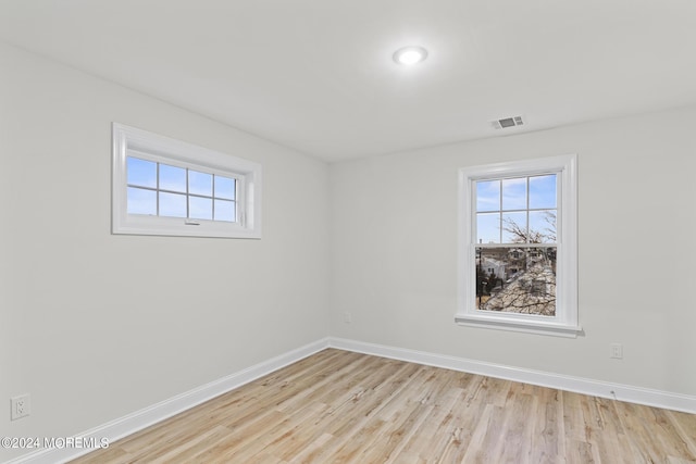 322 Lincoln Ave, Seaside Heights, NJ 08751 - spare room featuring visible vents, wood finished floors, baseboards, and a wealth of natural light