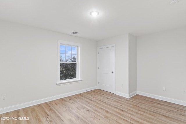 322 Lincoln Ave, Seaside Heights, NJ 08751 - empty room with visible vents, light wood finished floors, and baseboards