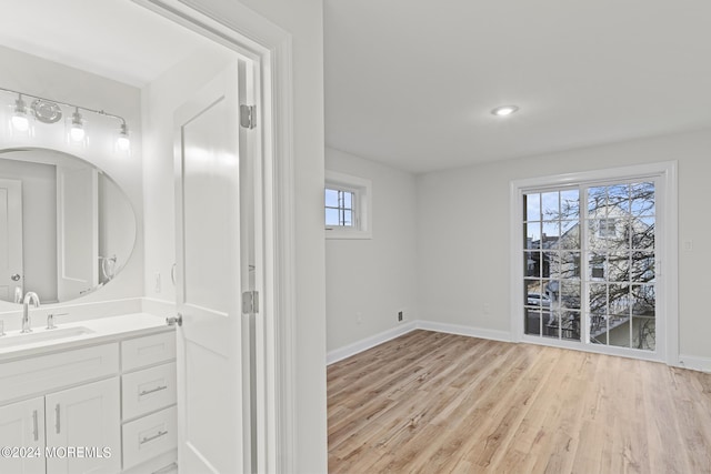 322 Lincoln Ave, Seaside Heights, NJ 08751 - bathroom with baseboards, vanity, and wood finished floors