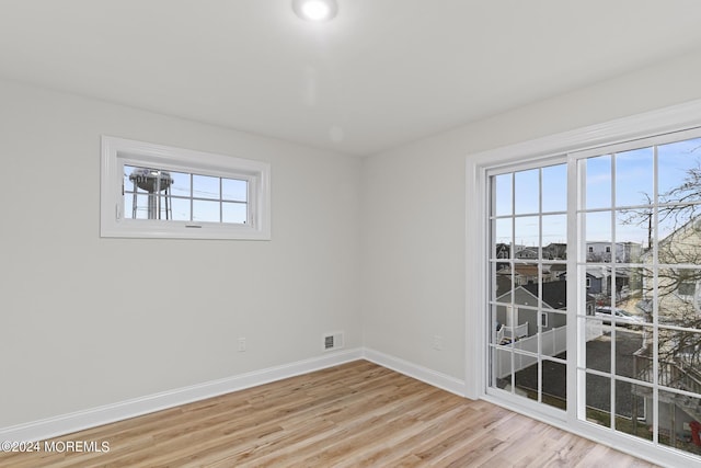 322 Lincoln Ave, Seaside Heights, NJ 08751 - spare room featuring baseboards, visible vents, and light wood-type flooring