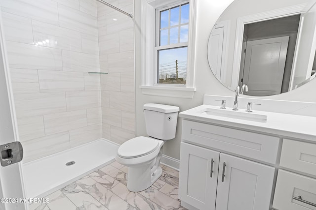 322 Lincoln Ave, Seaside Heights, NJ 08751 - full bathroom featuring vanity, marble finish floor, baseboards, a tile shower, and toilet