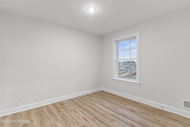 322 Lincoln Ave, Seaside Heights, NJ 08751 - empty room featuring visible vents, light wood finished floors, and baseboards