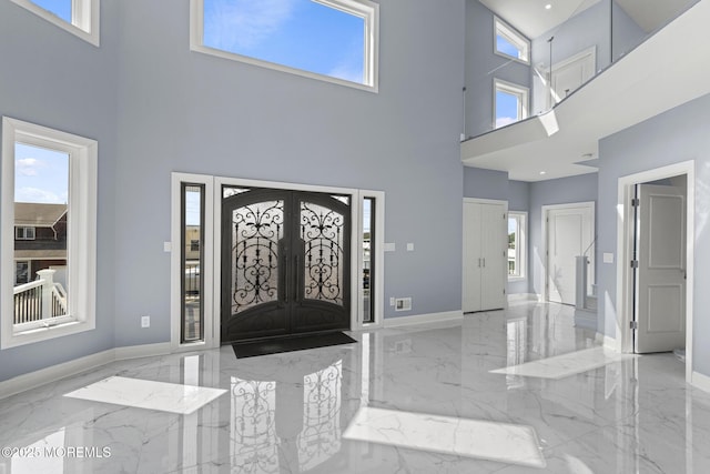 107 Bay Shore Dr, Toms River, NJ 08753 - entryway featuring a high ceiling, baseboards, and marble finish floor