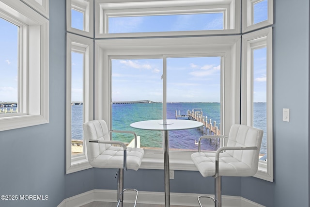 107 Bay Shore Dr, Toms River, NJ 08753 - dining area with a water view and baseboards
