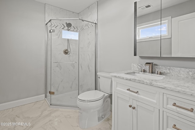 107 Bay Shore Dr, Toms River, NJ 08753 - bathroom with a marble finish shower, vanity, toilet, and marble finish floor
