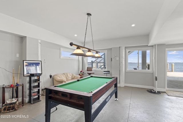 107 Bay Shore Dr, Toms River, NJ 08753 - game room with billiards, baseboards, finished concrete floors, and a wealth of natural light