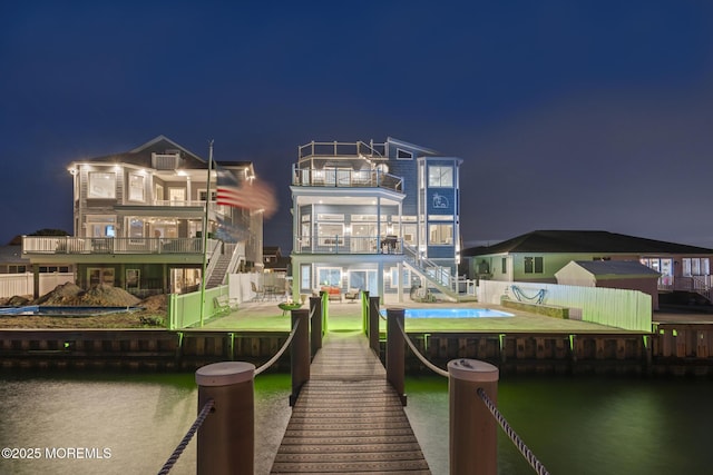 107 Bay Shore Dr, Toms River, NJ 08753 - dock area with fence, a patio, stairway, and a balcony