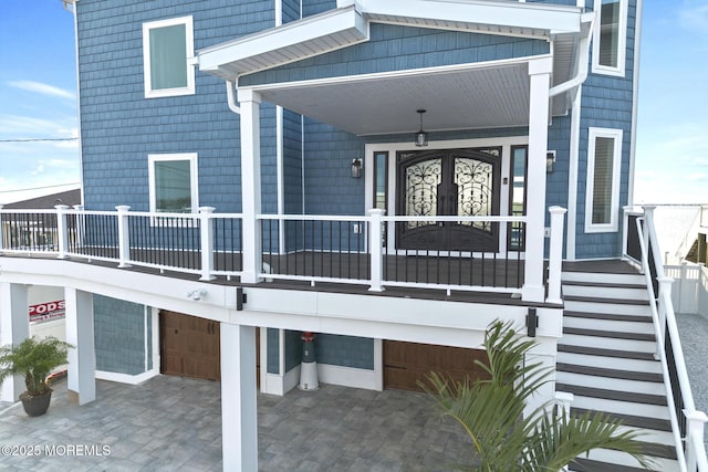 107 Bay Shore Dr, Toms River, NJ 08753 - property entrance with a garage and a porch