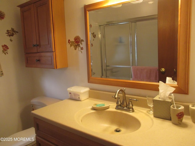 243D Jefferson Ct, Lakewood, NJ 08701 - full bathroom featuring a stall shower, vanity, and toilet