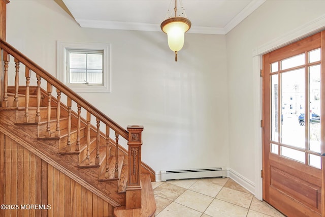 foyer featuring a baseboard radiator, a wealth of natural light, and light tile patterned floors