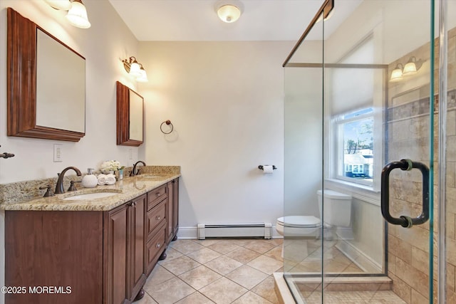 full bathroom with a baseboard heating unit, toilet, a stall shower, and a sink