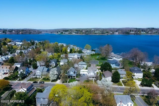 aerial view with a residential view and a water view
