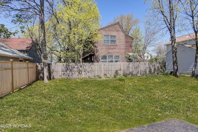 view of yard featuring a fenced backyard