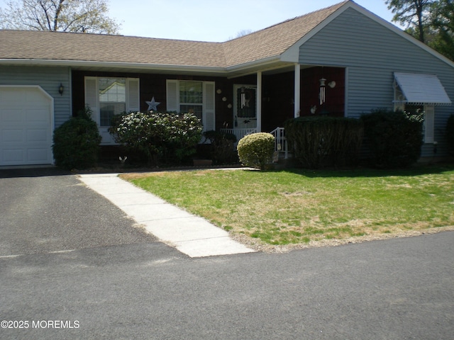 24 Dartmouth St Unit 61, Whiting, NJ 08759 - ranch-style house with a front lawn, roof with shingles, a porch, and a garage