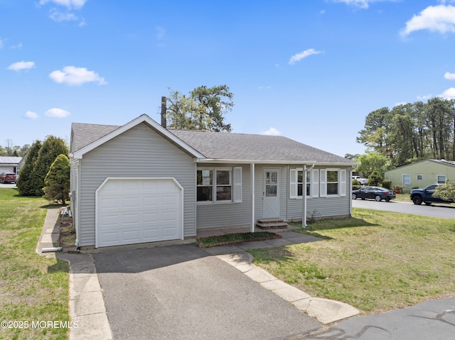 82 Falmouth Ave Unit 72, Whiting, NJ 08759 - view of front of house featuring entry steps, an attached garage, a front yard, asphalt driveway, and a shingled roof