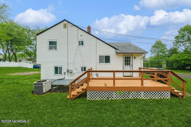 20 Telegraph Hill Rd, Holmdel, NJ 07733 - back of house featuring central AC, a yard, a deck, roof with shingles, and a chimney