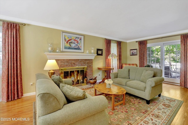 4 Briarcliff Ln, Holmdel, NJ 07733 - living area featuring light wood-style floors, crown molding, a fireplace, and baseboards
